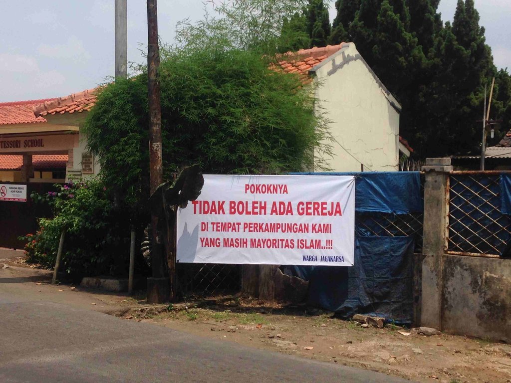 banner--penolakan--alihfungsi-haris-gunawan-tirto-1